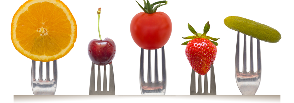 Five fruits and vegetables on forks 